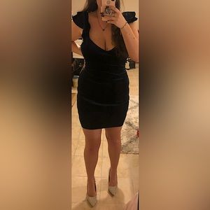 Navy blue velour dress from Dillards. Ruffle sleeves, lattice back with zipper.